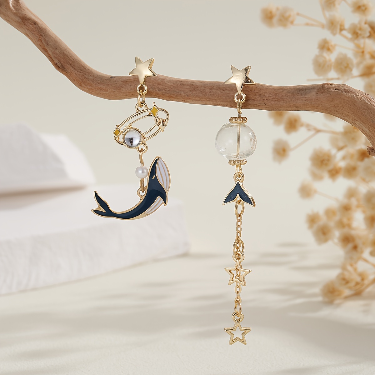 Image of Asymmetrical Tassel Earrings Featuring Like Whales And Stars, Perfect For Women To Wear At Parties