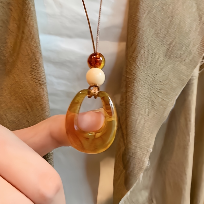 1 Bohemian-style Long Hollowed-out Geometric Brown Resin Pendant Necklace, Elegant And , Suitable For Women' Wear, Banquets, And Vacations