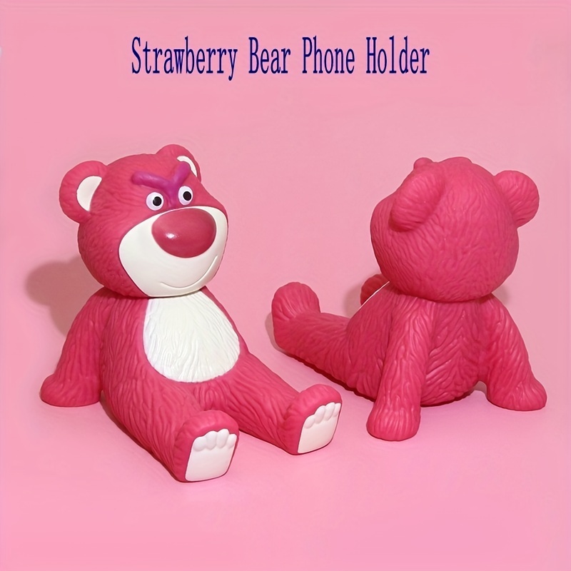 

Strawberry Bear Phone Holder: Cute Pink Rubber Bear With A Sitting , Holding Your Phone - Not Waterproof