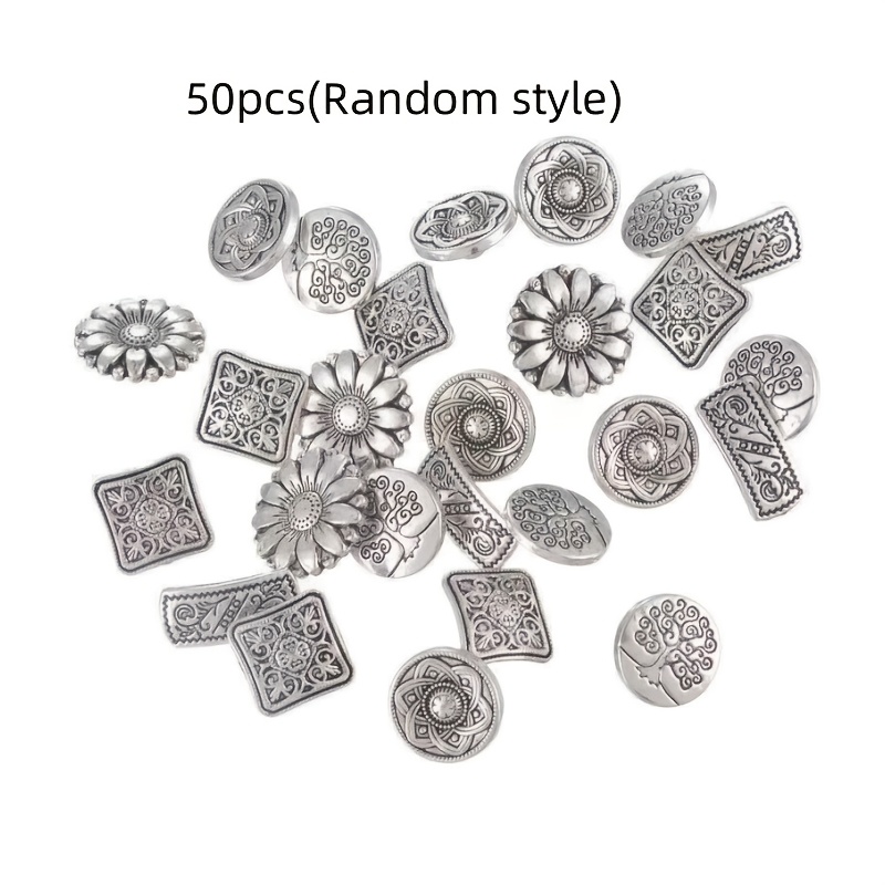 A Set Of 50 Silver Metal Buttons For Sewing And Projects, Featuring A Of Retro-style Designs Including Floral, Round, And Square Shapes, Perfect For A Creative Touch To Coats And Other Additions