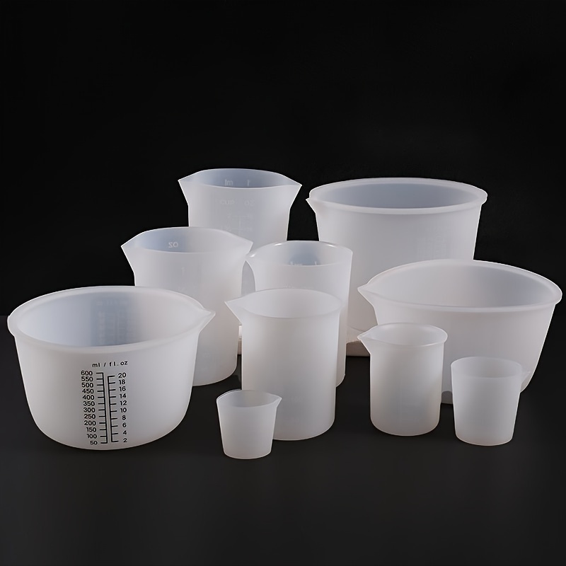 

Set de tasses à mesurer en silicone sur le thème de la fantaisie : 30 ml, 50 ml, 100 ml, 250 ml, 350 ml, 600 ml, 1000 ml - Parfait pour la fabrication de bougies et l'artisanat à la cire