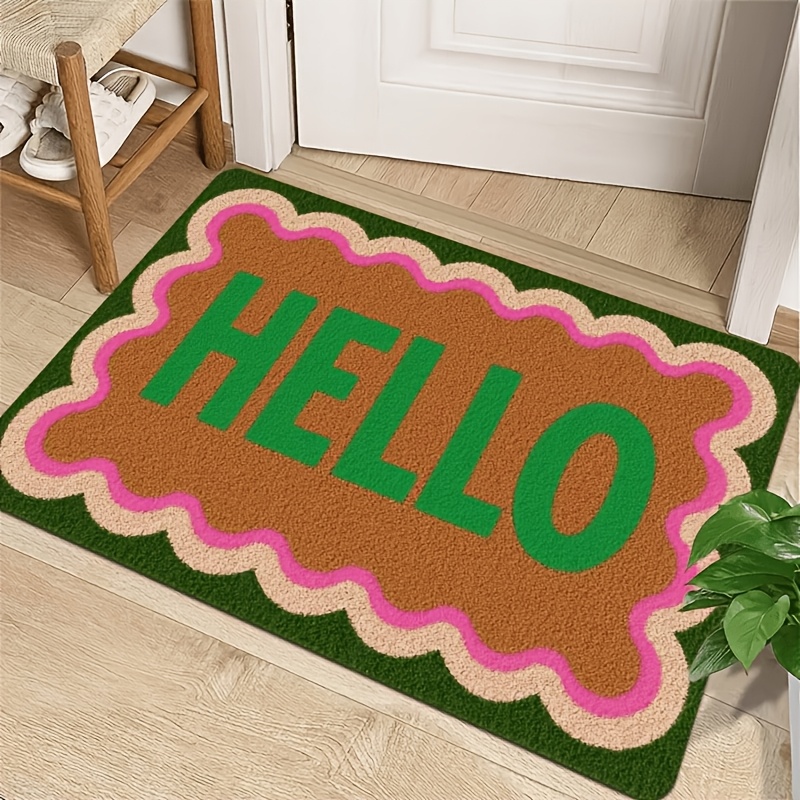 TEMU 2d Flat Printing Hello Wavy Edge Doormat, Featuring A Brown Base With A Green "hello" Print, Accented With Pink And Beige Border Trim. Suitable