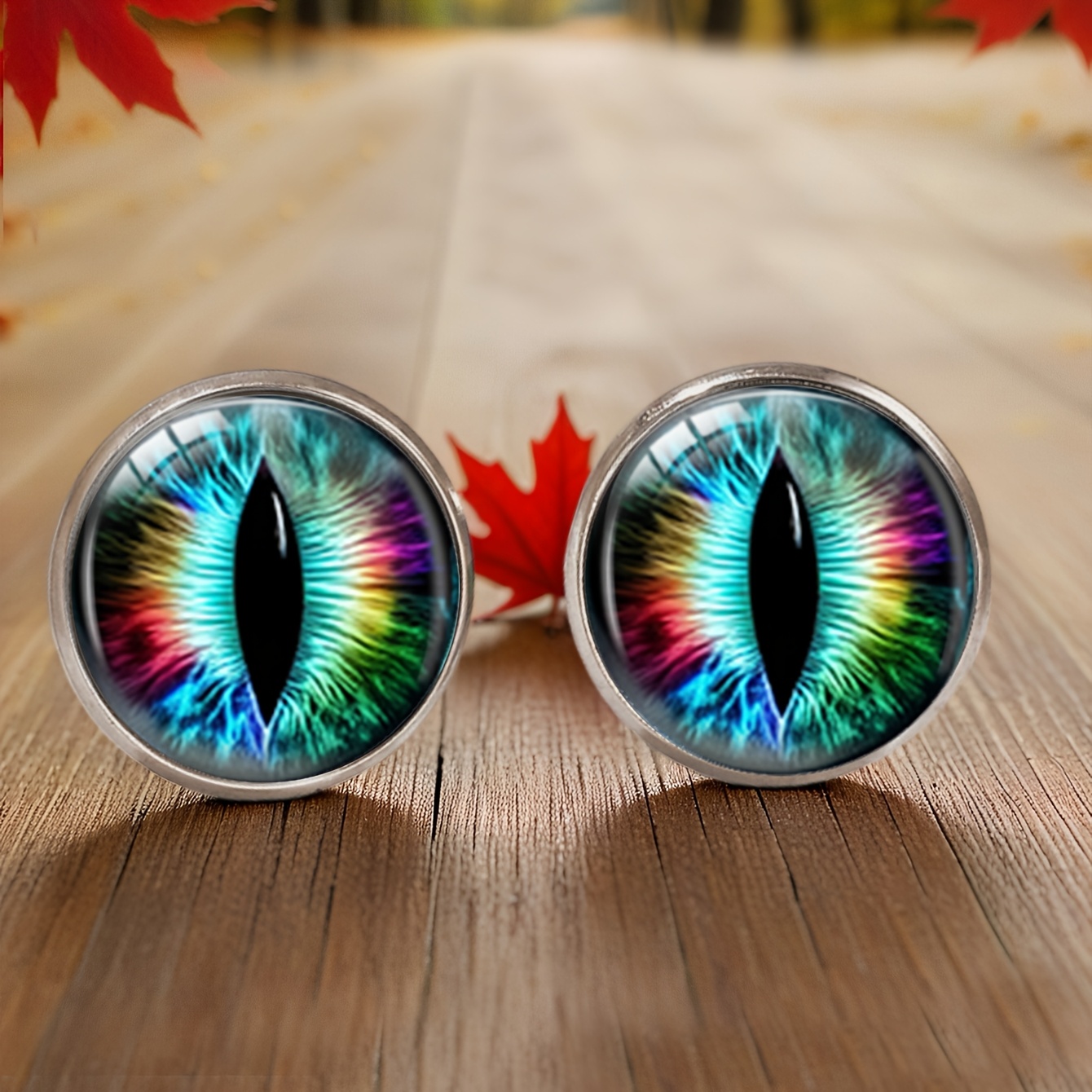 A Pair Of Colorful Cat-eye Patterned Stainless Steel Stud Earrings For Women