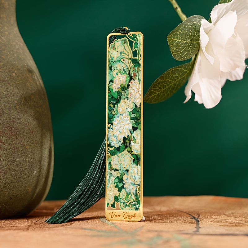 TEMU Marcapáginas de metal con pintura floral vintage, diseño hueco y baño dorado con borla, ideal como regalo de papelería para amantes de los
