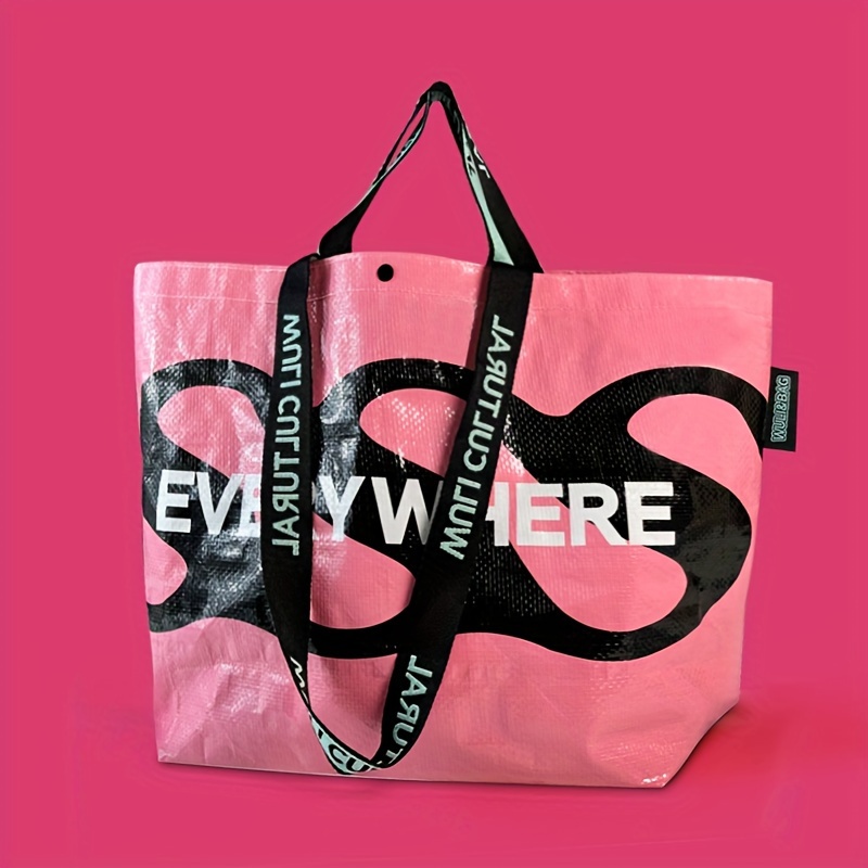

1pc Large Capacity Reusable Tote Bag, Woven Single-strap Shoulder Bag, Foldable Portable Shopping Bag, Plastic Pp Storage Sack, Travel Carry-all, Bold Text Design, Pink & White