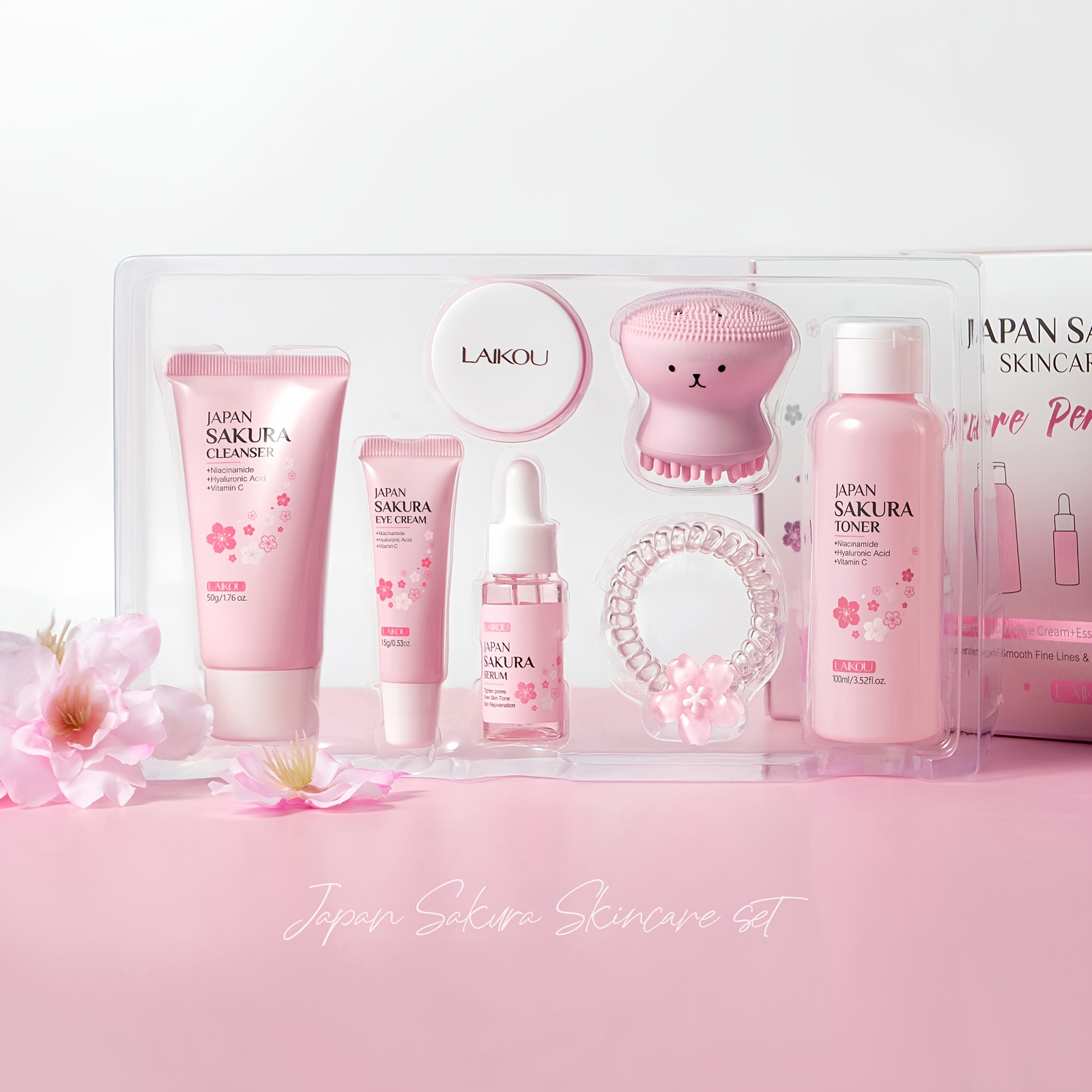 LAIKOU Sakura Poklon Kutija 7-dijelni Set za Njegu Kože, Niacinamid za Posvjetljivanje Protiv Otpadanja, Serum, Krema za Hidrataciju Lica, Krema za Oči, Tonik, Blago Čišćenje Lica, s Četkom za Kosu i Gumicom za Kosu, Rođendanski i Božićni Pokloni