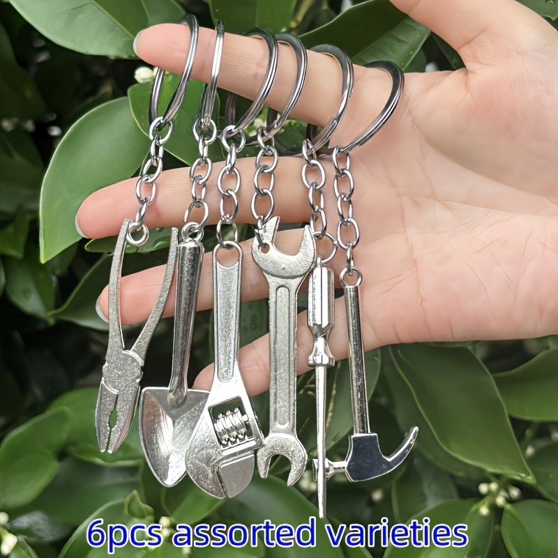 E-shop 6-teiliges Mini-Werkzeug-Schlüsselanhänger-Set im zufälligen Stil, -Style, multifunktionaler Werkzeug-Schlüsselanhänger-Anhänger, ideales