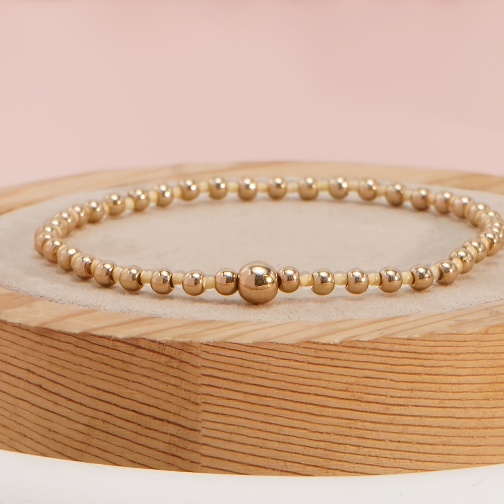 Braccialetti elastici rotondi modello heishi Canopée