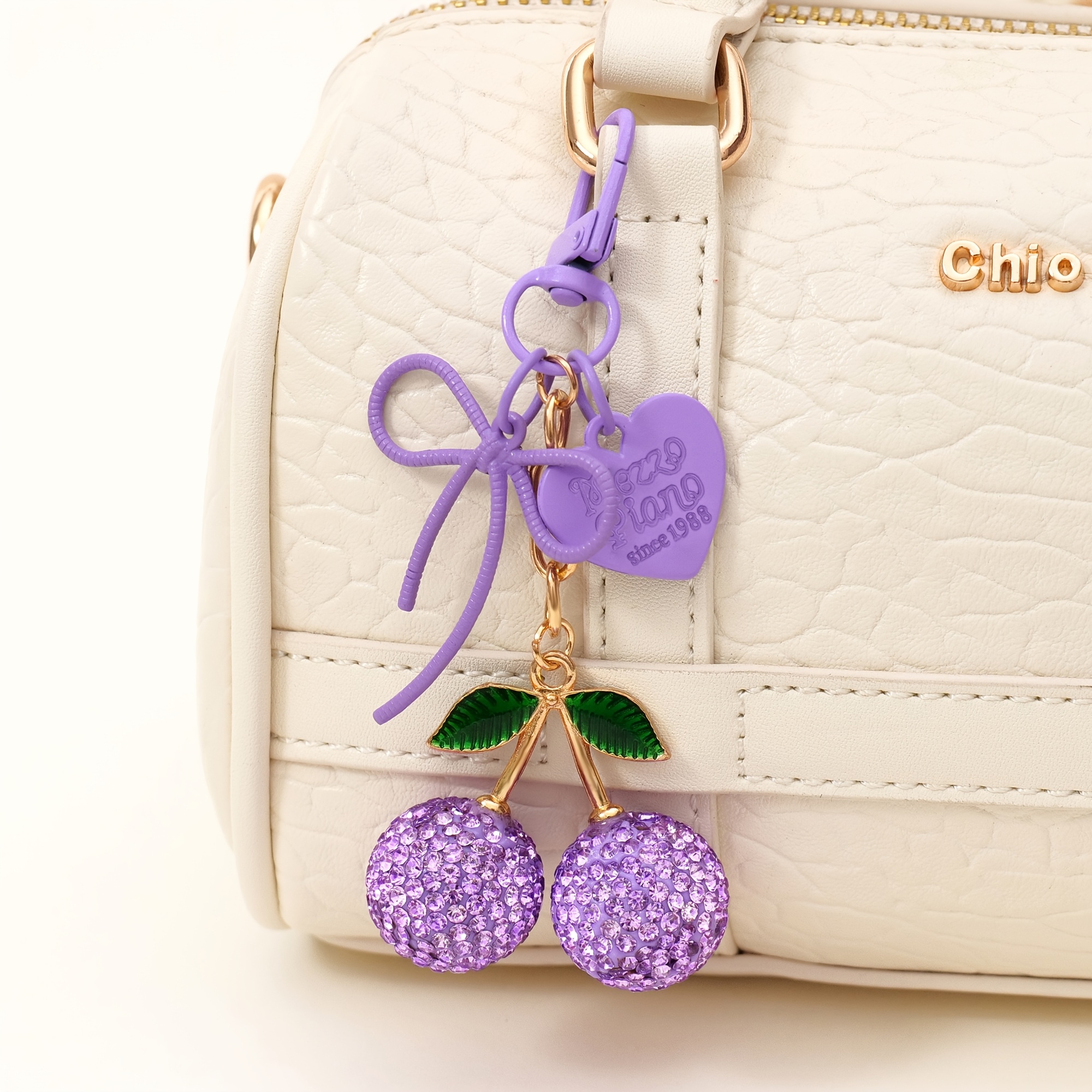 TEMU 1pc Big Size Purple Rhinestone Cherry Keychain, Sparkling Purple Cherry Pendant With Green Leaves, Purple Heart & Bow Charms, Alloy Metal,