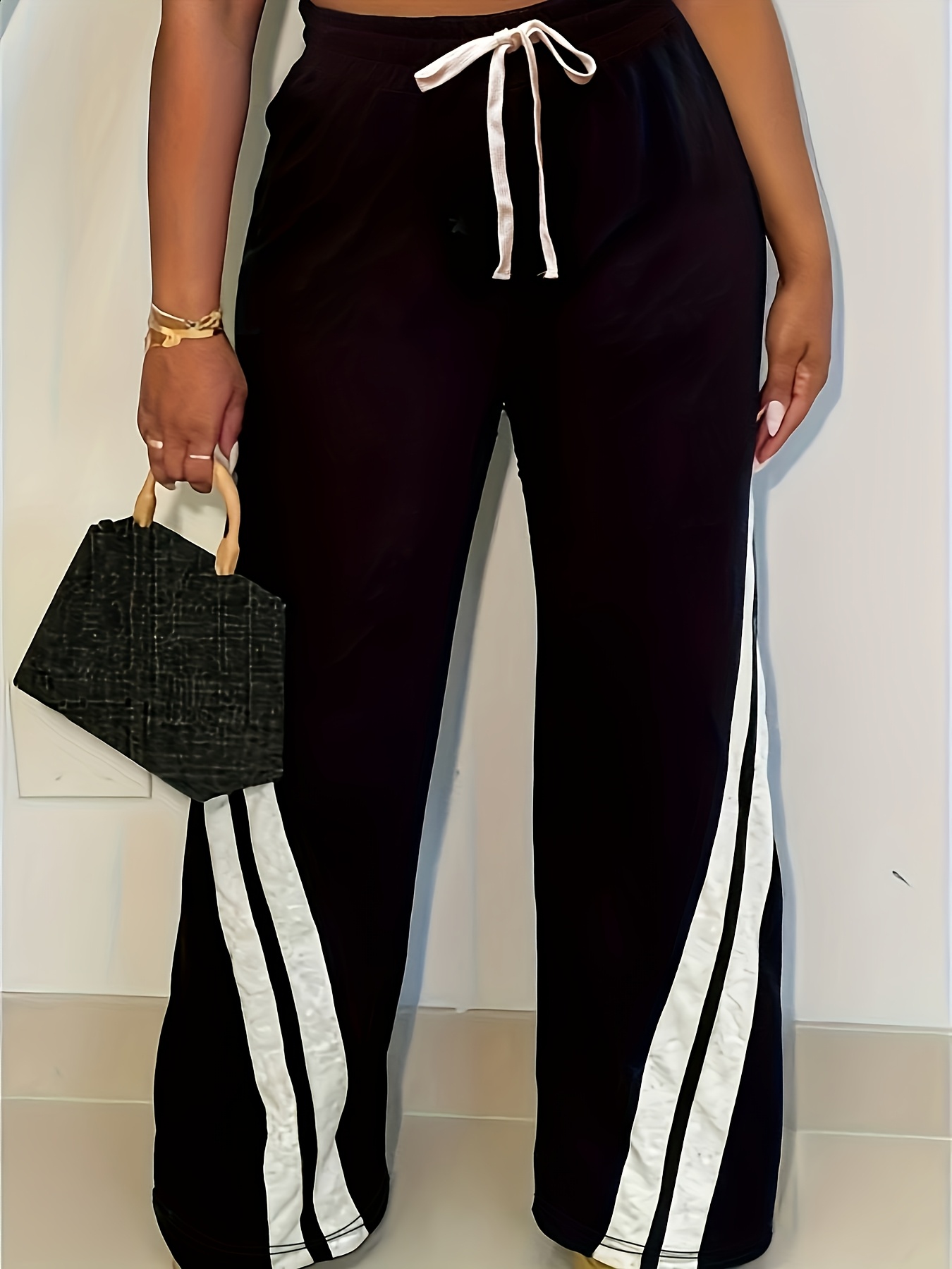 black and striped pants sold on Temu United States