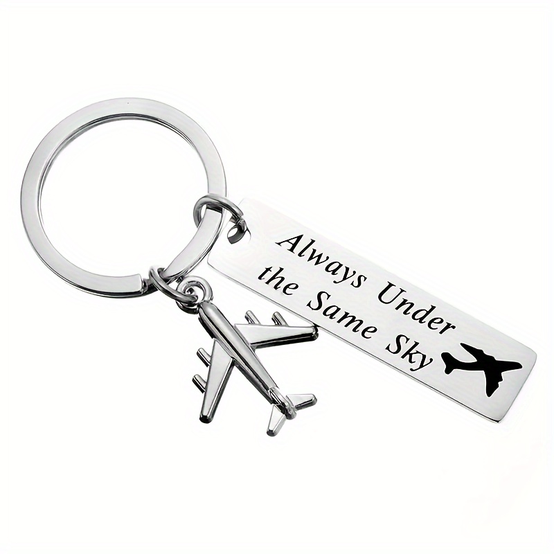 A Keychain Shaped Like An Airplane, Engraved With ' Under Sky', A Creative Gift For Aviation Enthusiasts, The For Crew , And A Gift For Flight Attendants