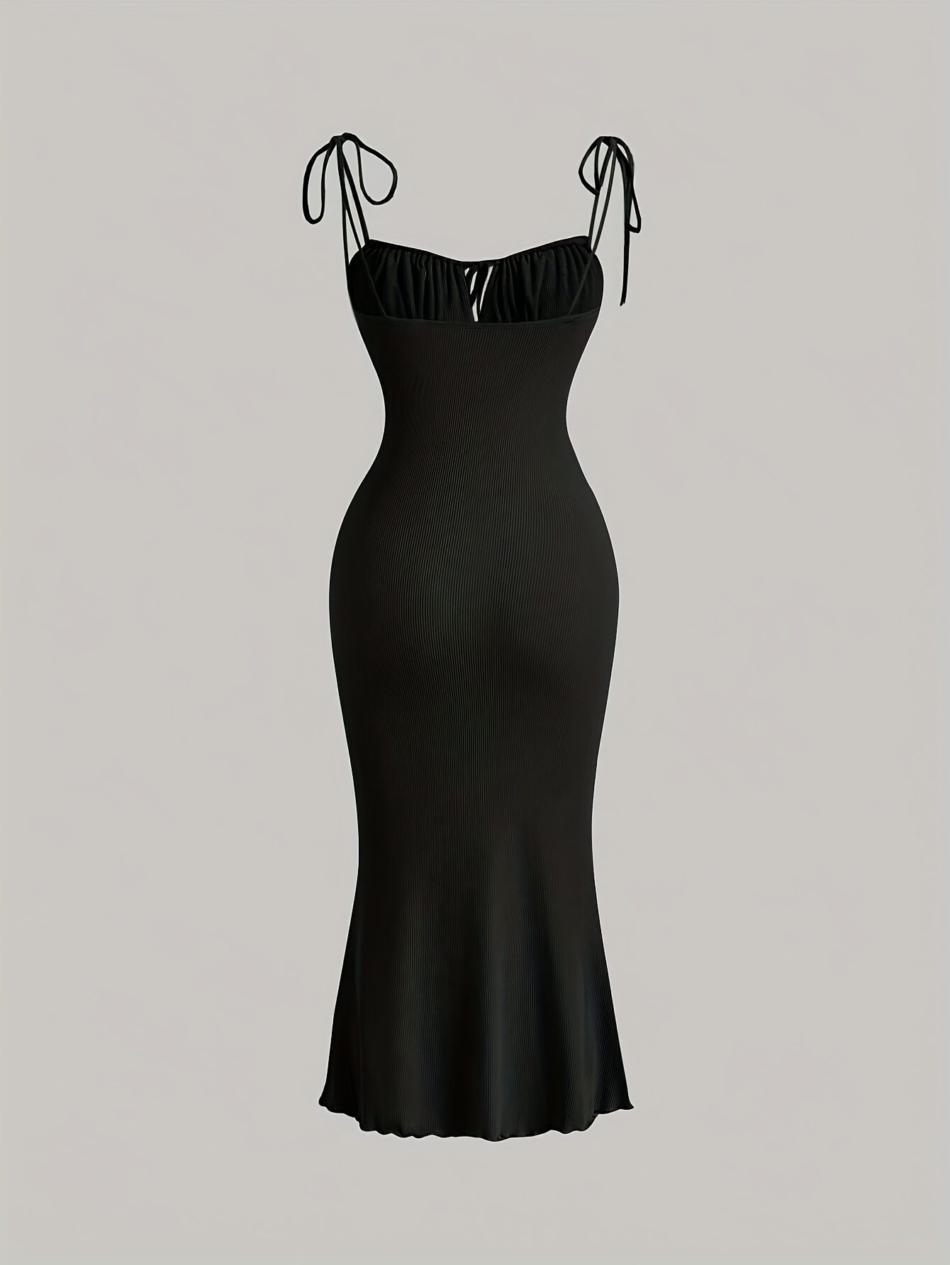 A Stylish Dress for Women Featuring Front Pleats, a Tied Chest, And Shoulder Straps