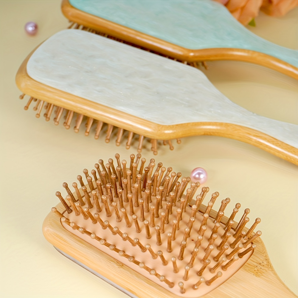 1pc of a large air cushioned bamboo comb featuring acetate patch bamboo bristles for detangling a wooden paddle hairbrush that massages the scalp is anti static and serves as a   care tool making it an ideal christmas present