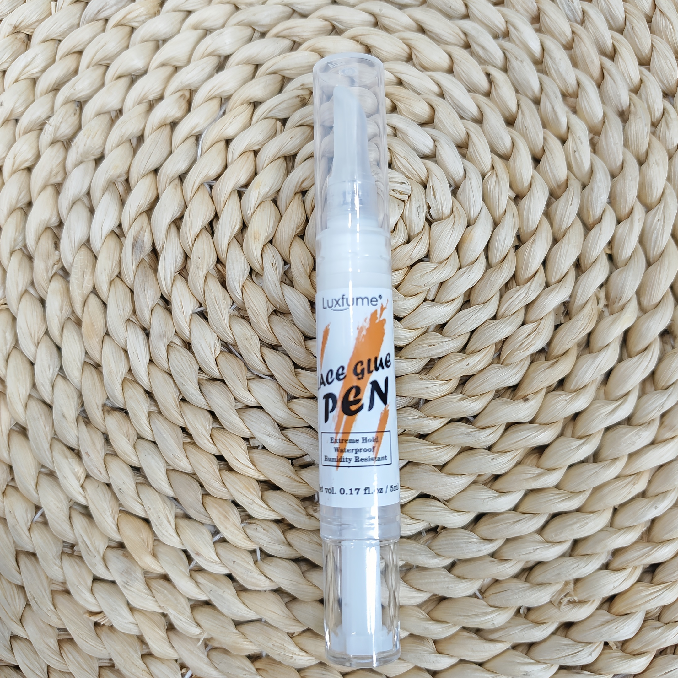 A Portable Lace Glue Pen For Wigs, Featuring A Twistable Waterproof White Adhesive For Lace Front Wigs, Designed With A To Prevent Skin Irritation