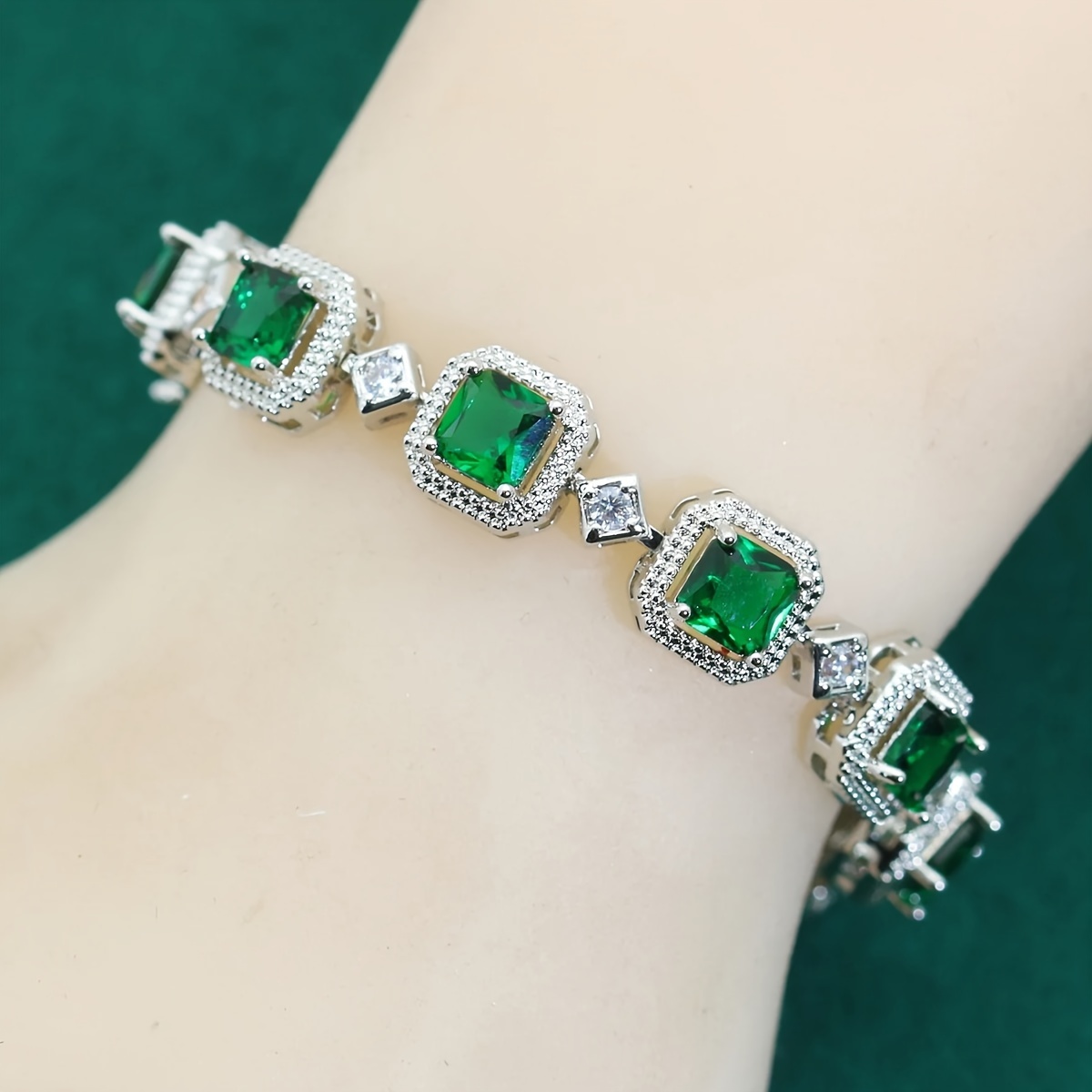 elegant luxury synthetic green gemstone jewelry set for women platinum plated copper with zirconia stones   ring earrings necklace bracelet 5 piece bridal banquet set   ideal for weddings valentines day 267 pave set zirconias   cut 10x12mm gems 11 gemstone link bracelet details 4