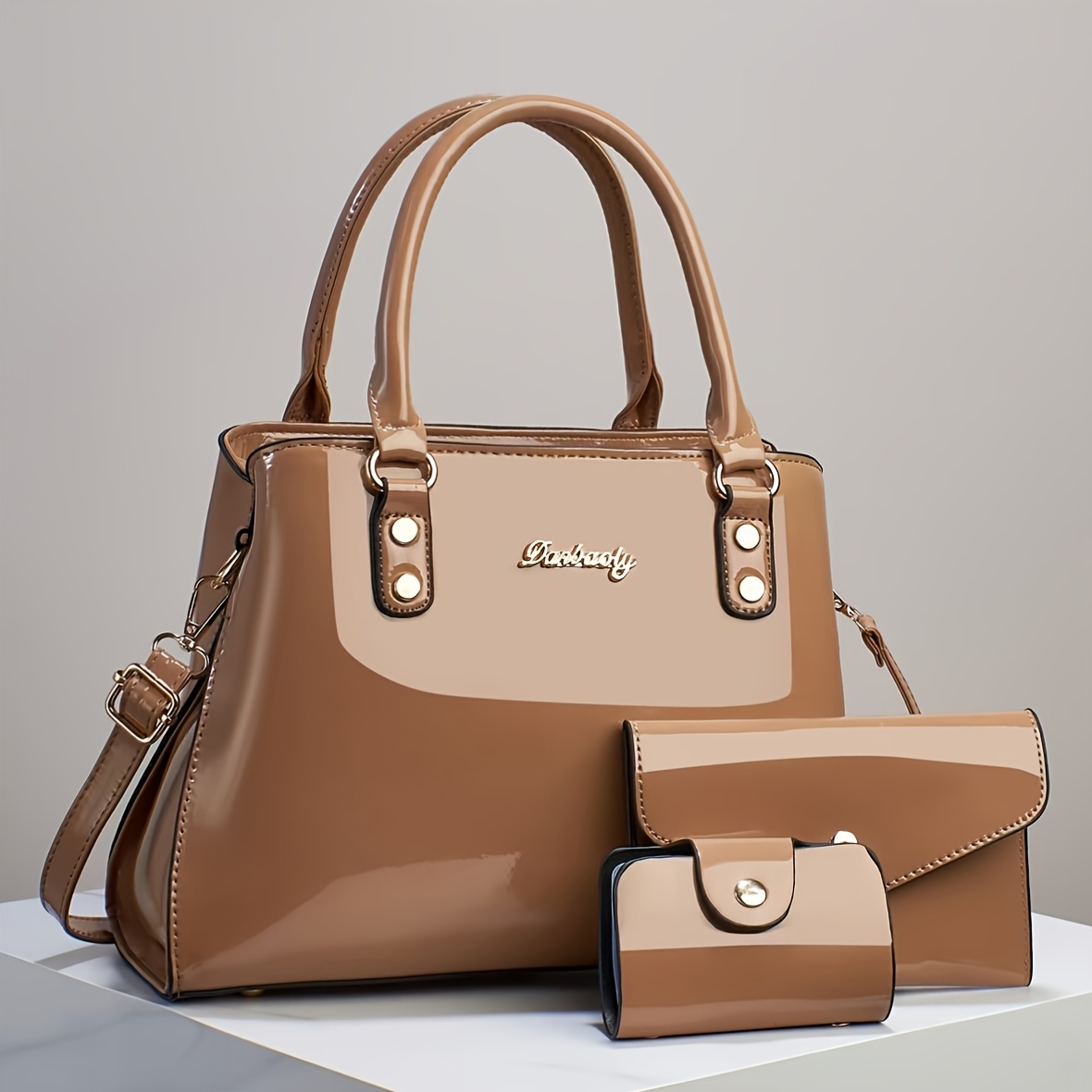 Trendy And Versatile Women'S High-End Multi-Layer Bag Set, Featuring a Stylish Casual Crossbody, Shoulder Bag, And Large-Capacity Tote in a Glossy Patent Finish.