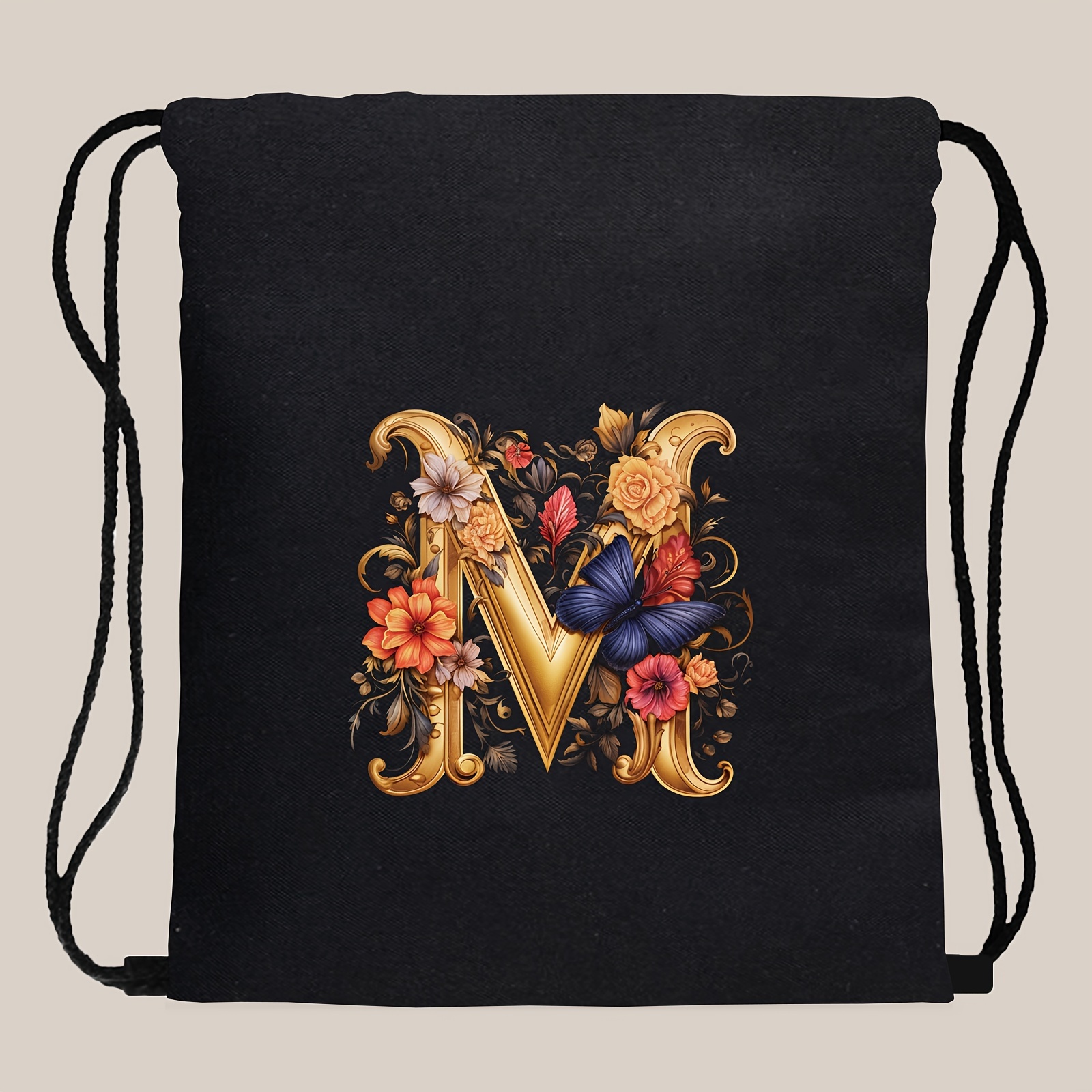 Image of A Black Drawstring Bag Featuring An A-z Letter Print Design, Made From Soft Material, Ideal For Organizing Items For Fitness, Shopping, Sports, And Yoga