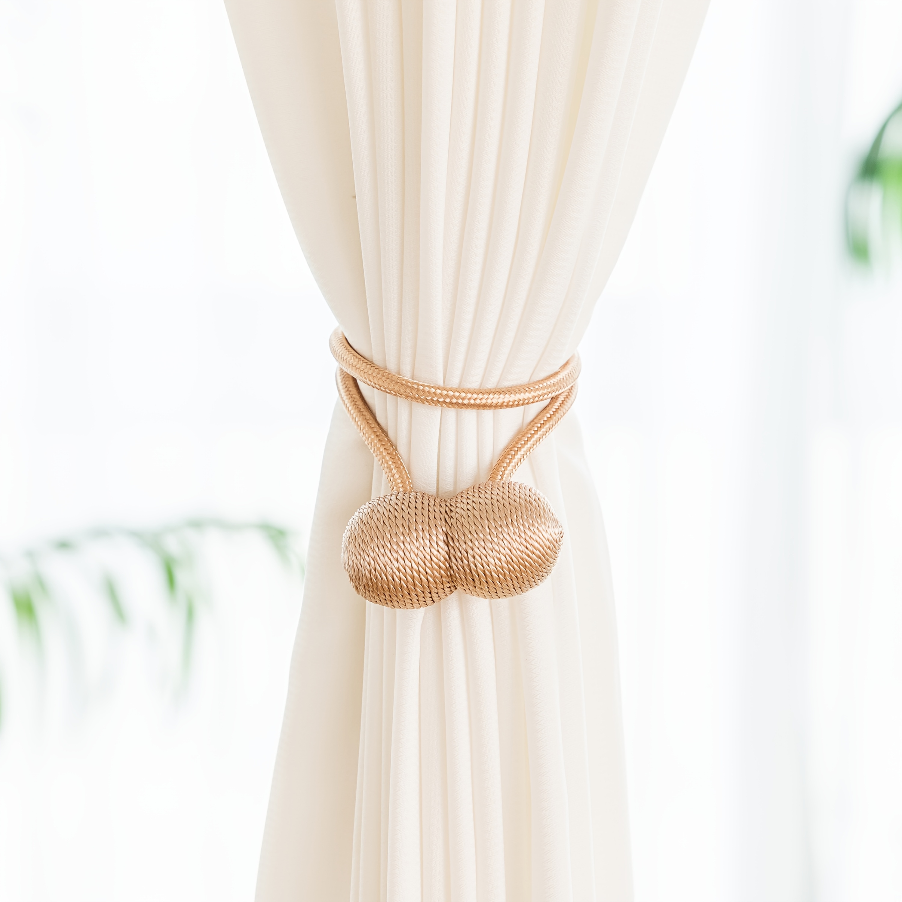 A Set of Two Modern Minimalist Magnetic Curtain Ties Is on, Featuring Thicker Twisted Ropes And Flexible Magnetic Ties. They Are Durable, Easy to Install, And Do Not Require Drilling, Making Them Perfect for Bedroom And Living Room Decor