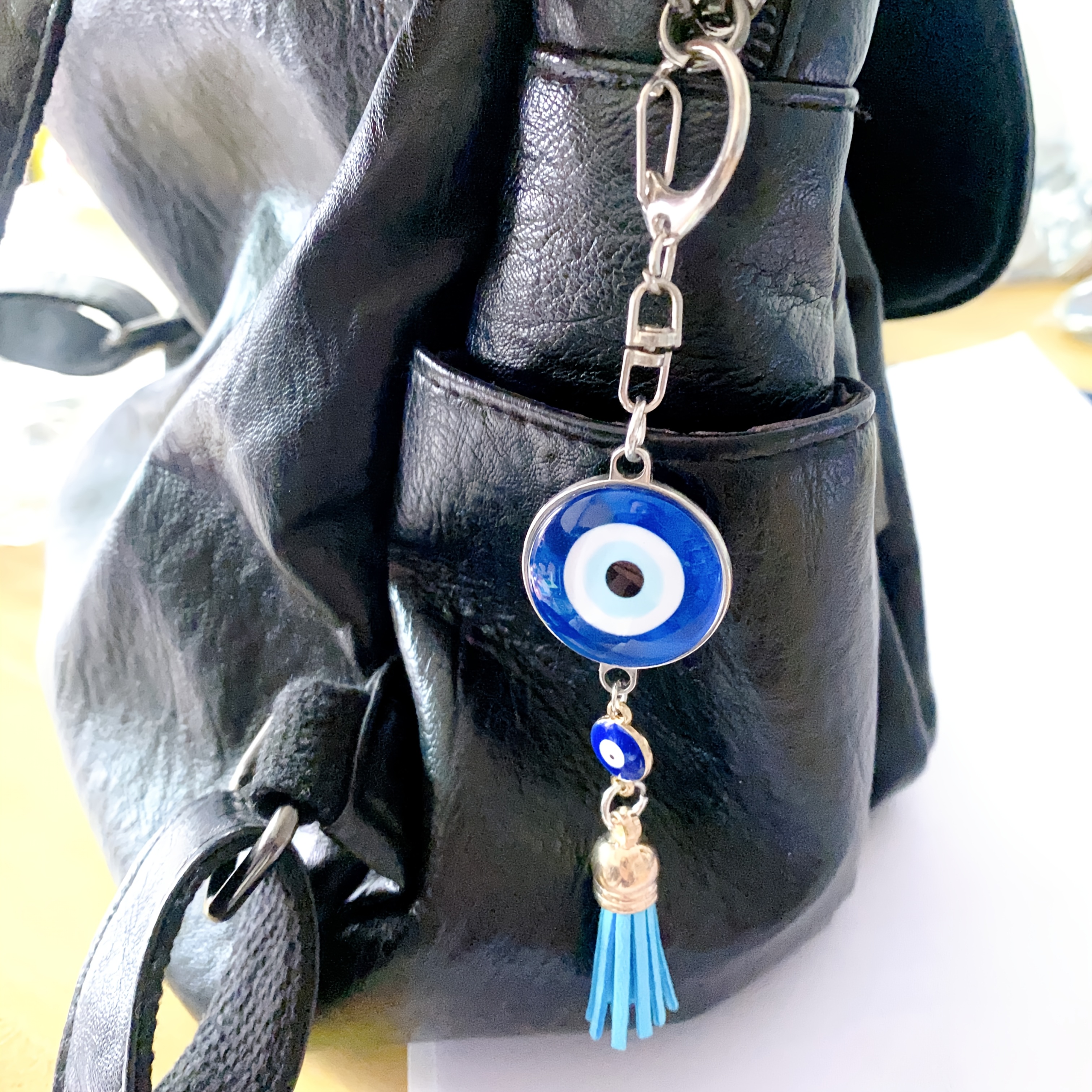 TEMU 1 porte-clés vintage à pompon bleu œil maléfique double face, idéal pour sac à dos, portefeuille et accessoires de voiture, un
