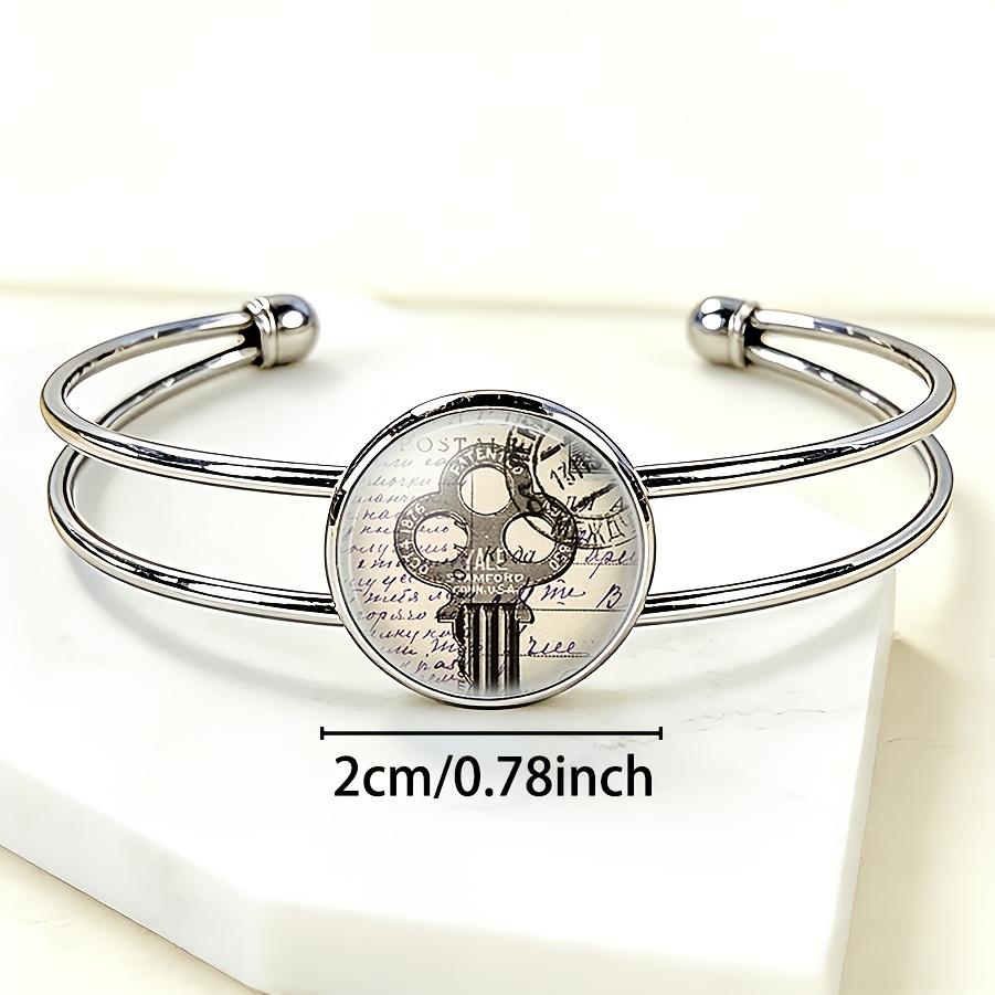 Adjustable Open Bangle with Retro Postage Stamp Design
