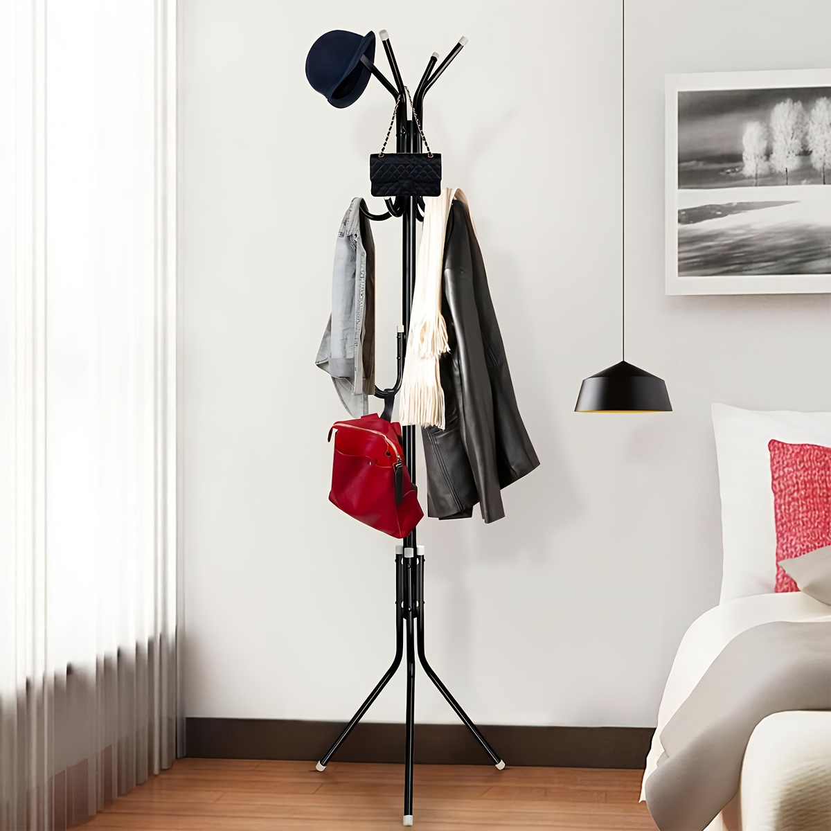 TEMU This Is A 12-hook Coat Rack Easy To Put . It Serves Multiple Purposes And Features A Sturdy Black Made From Thick Metal, Making It Very Stable.