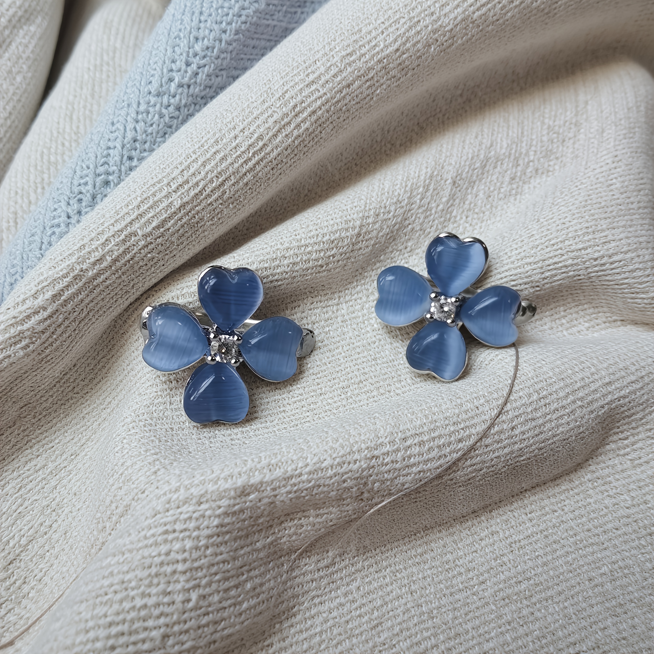 Women's Ice Blue Cat's Eye Four-Leaf Flower Stud Earring
