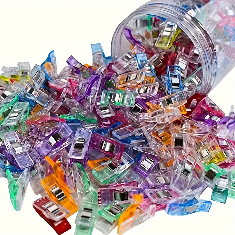 a set of 50 sewing clips with stainless steel springs   in   colors   quilting bookbinding and craft projects