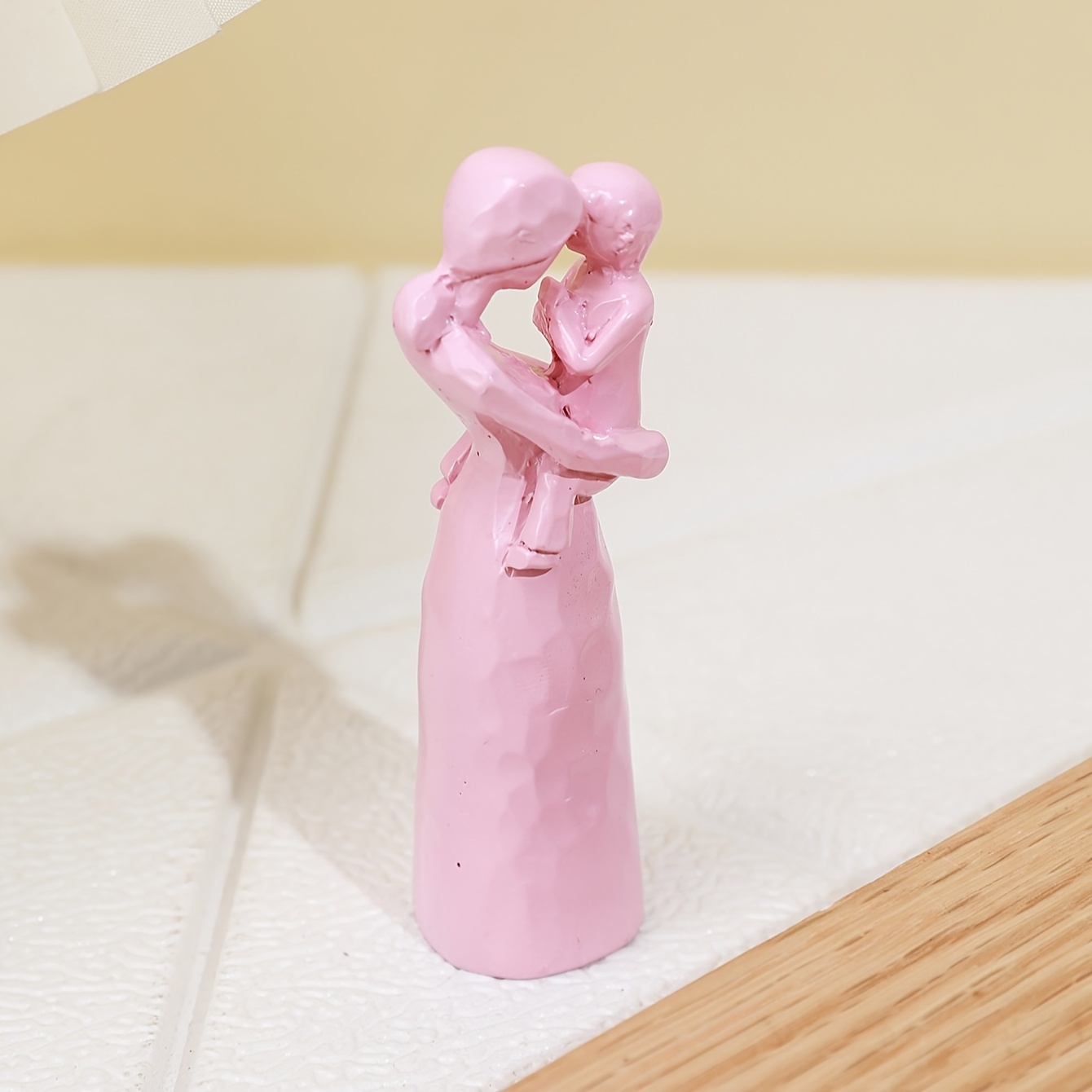 a decorative figurine of a mother and Product details 7
