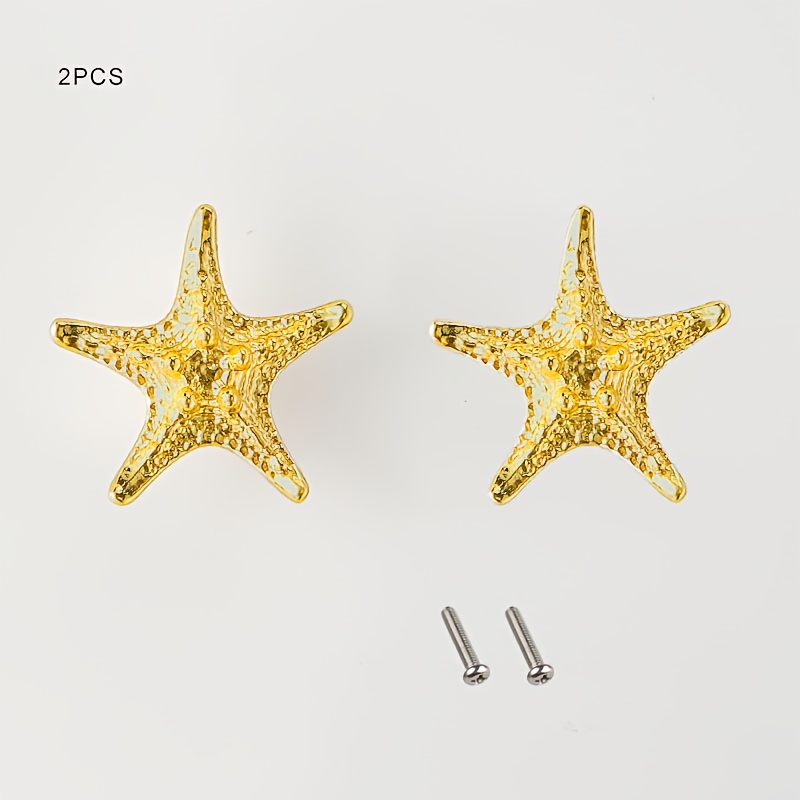 E-shop Set mit 2 goldenen Seestern-Schrankgriffen - Glänzende Metall-Schubladengriffe, Knöpfe für Zuhause und Küche, Einloch, Kompakter Griff,