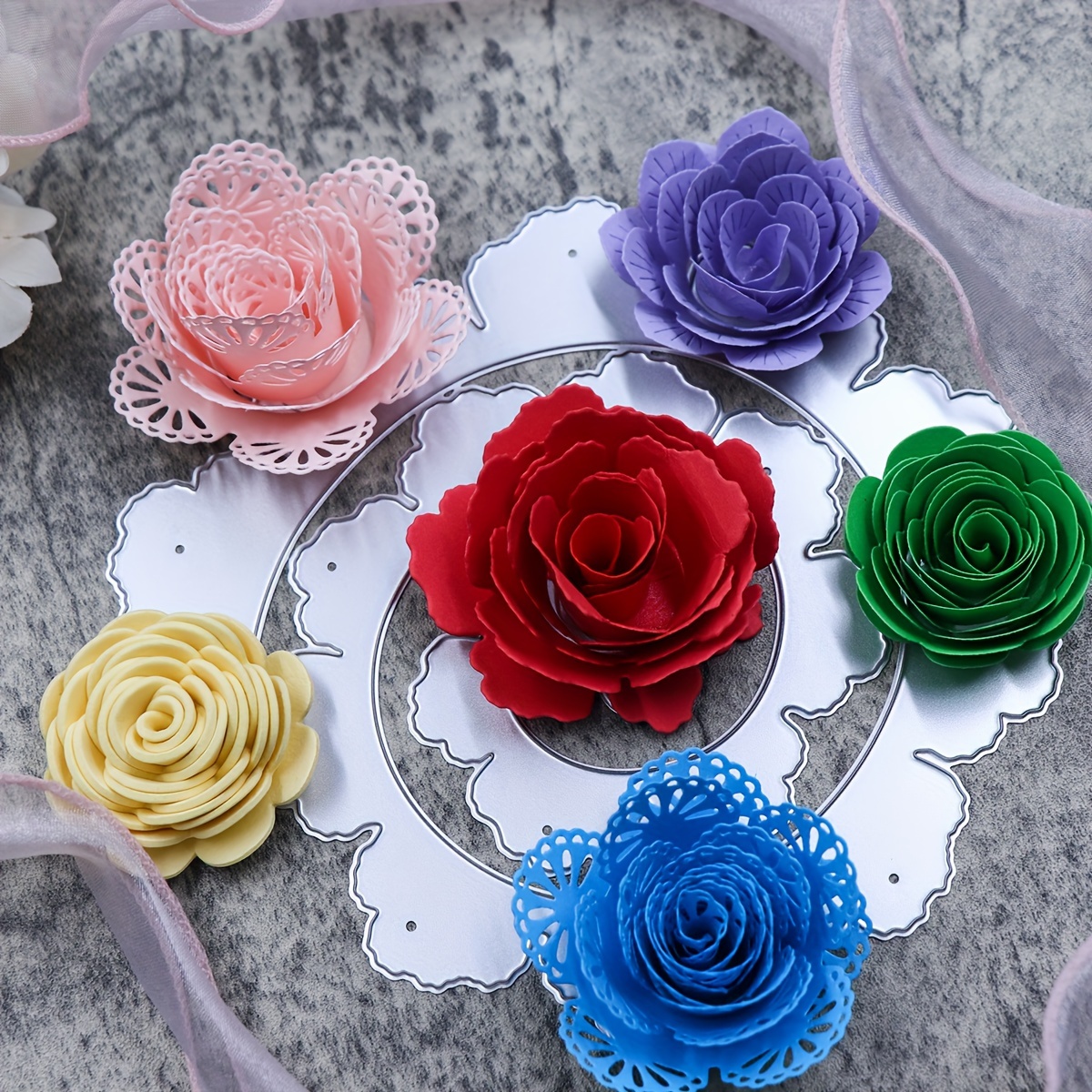 

A Cutting And Embossing Knife Mold For Large Golden Paper Flowers With Different Styles.