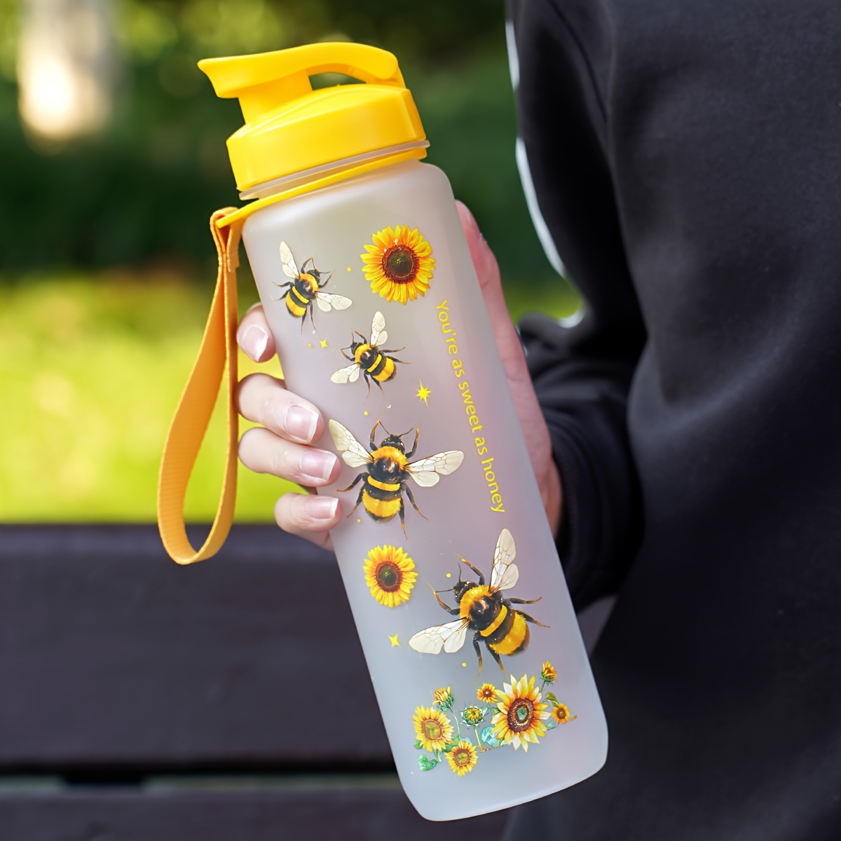 Image of 1pc 32oz (1000ml) Cute Bee & Sunflower Sports Water Bottle - Portable Design, Plastic, Ideal For Outdoor Activities, Travel, And Holiday Gifts, Sports Drinkware | Cartoonish Graphics | Lid