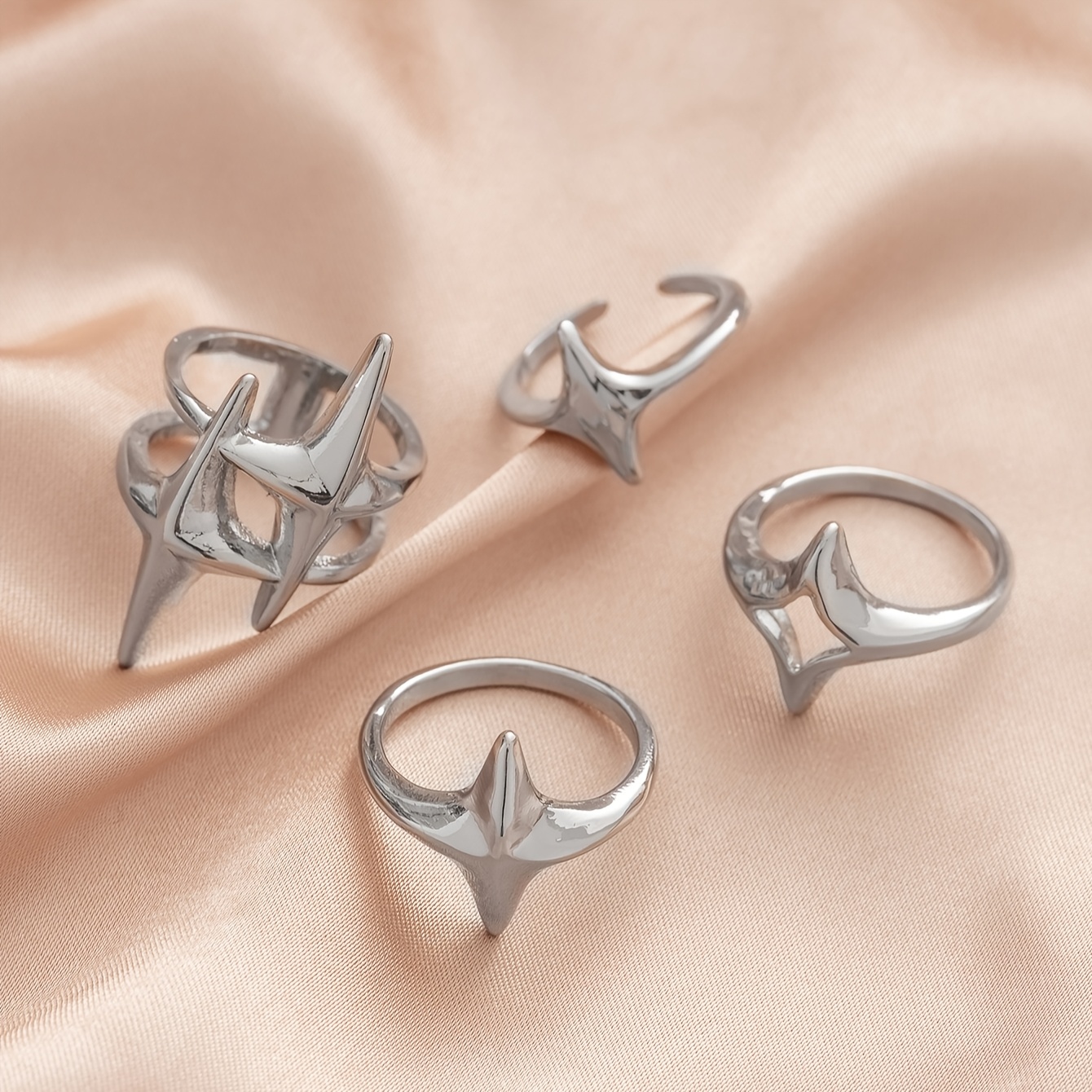 4pcs Women's Hip Hop Exaggerated Four Pointed Star Ring Set