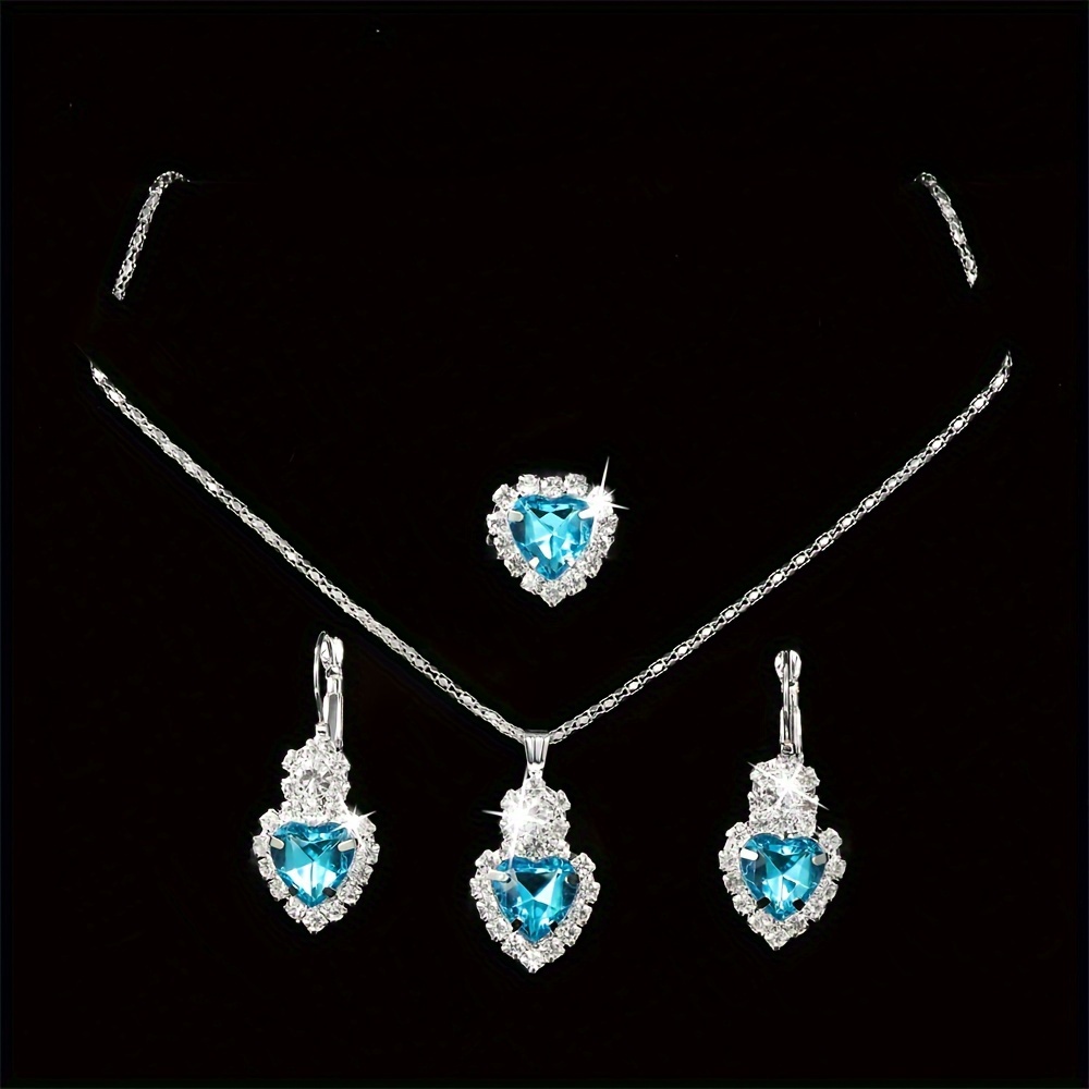 

Blue Pendant Necklace, Drop Earrings, And Ring Set With Heart-shaped Imitation Gems Inlaid, Alloy Jewelry Set For Women Daily Use