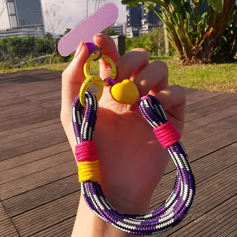 Foto de Strap/correa de mano adaptable a cualquier celular.