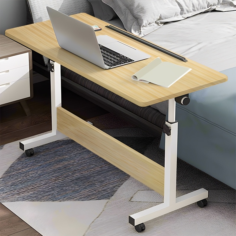 Image of A Portable Laptop Desk That Adjusted In Height, Featuring Wheels For , Ideal For A For Home Office Setup
