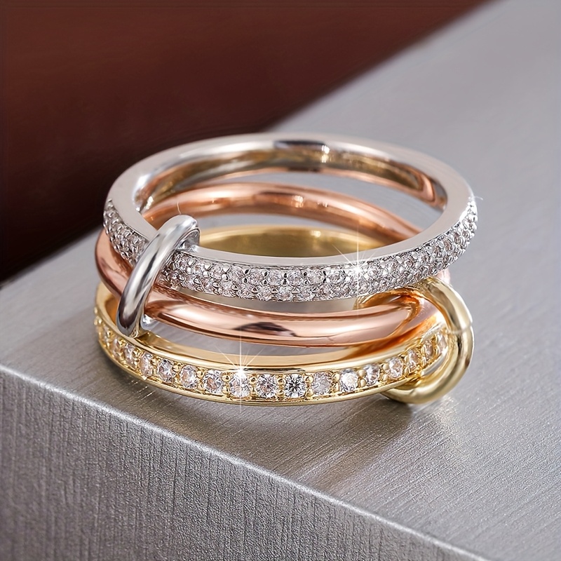 item picture a fashionable interlocking ring design for women set with synthetic synthetic zirconia