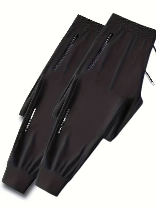 2pcs mens casual pants elastic waist with adjustable drawstring non stretch fabric regular fit tapered leg side pockets solid black for attire relaxed outfit durable construction drawstring waistband urban style