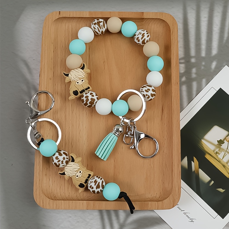 TEMU 2pcs/set Cow Silicone Hand Chain Keychain Silicone Bead Bead Short Cute Keychain Anti Loss Car Keychain Bag Pendant Holiday Gift
