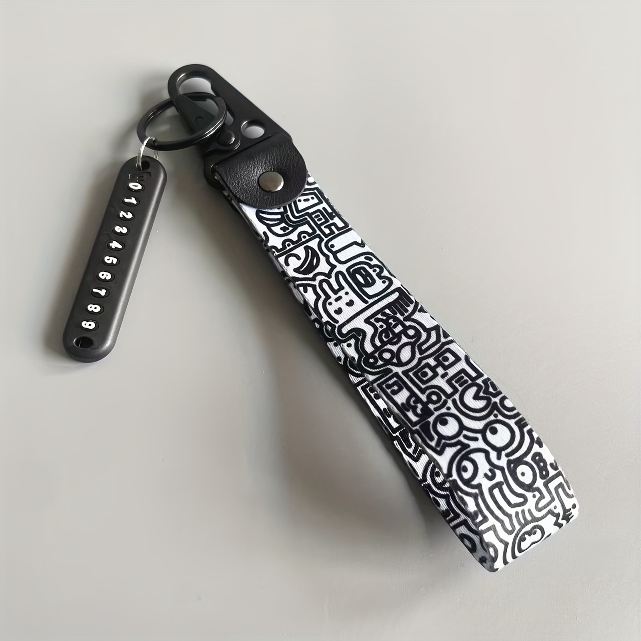 TEMU Minimalist Art Anti-loss Key Chain Keychain Trendy Must-have Black And White Graffiti Anti-keychain Lanyard Wristband Key Lanyard Suitable For