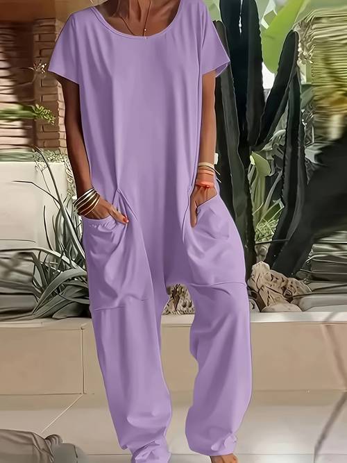 a womens loose fitting romper with pockets in a single color