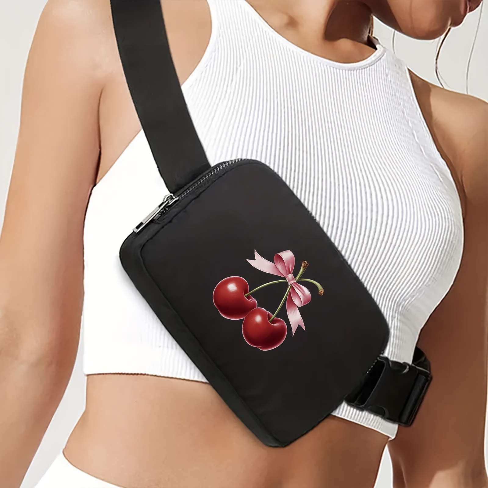 

A Stylish And Simple Black Waist Bag For Girls Featuring A Cherry Pattern, Casual And For Carrying A Phone.