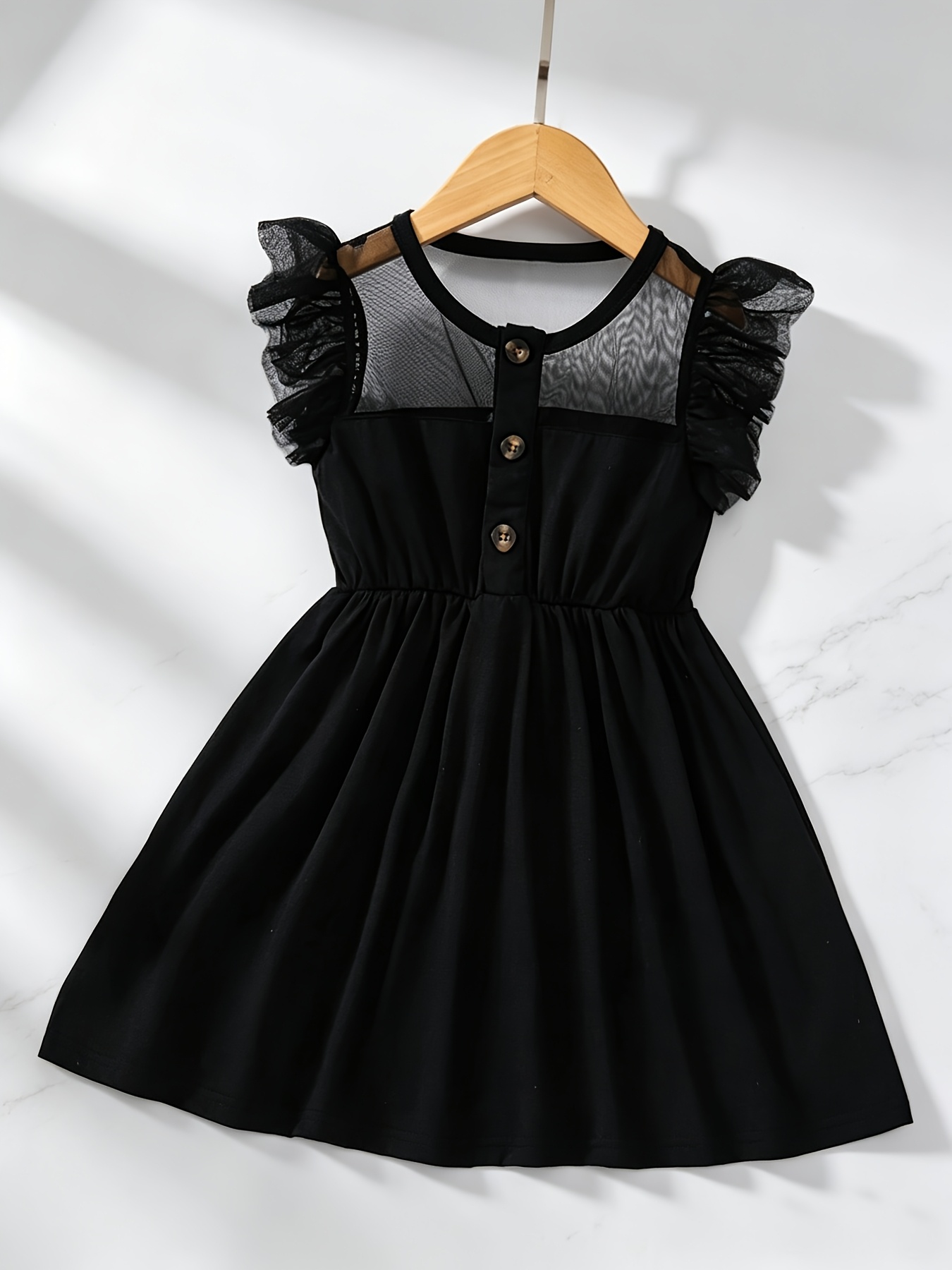 black dresses girls sold on Temu United States