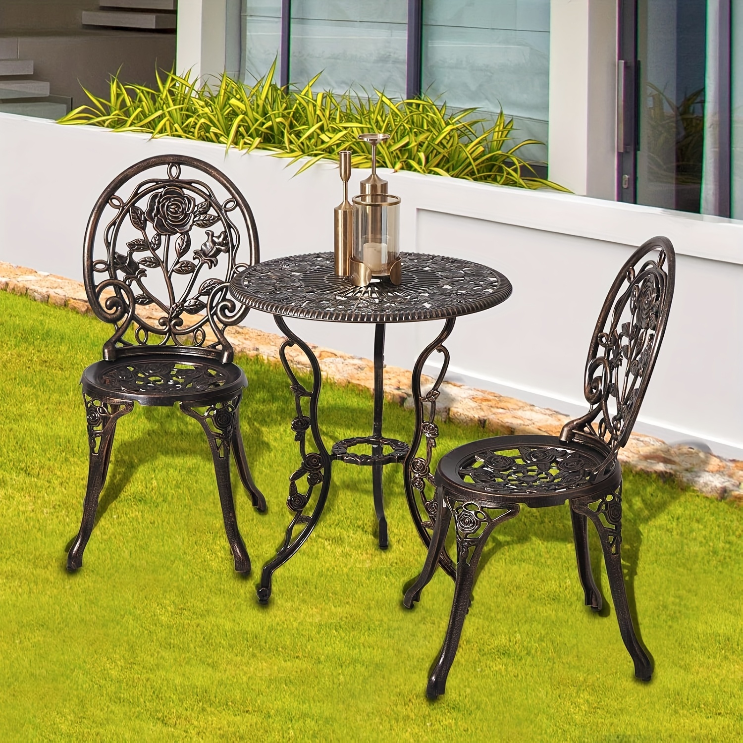 cast iron garden table and 2 chairs