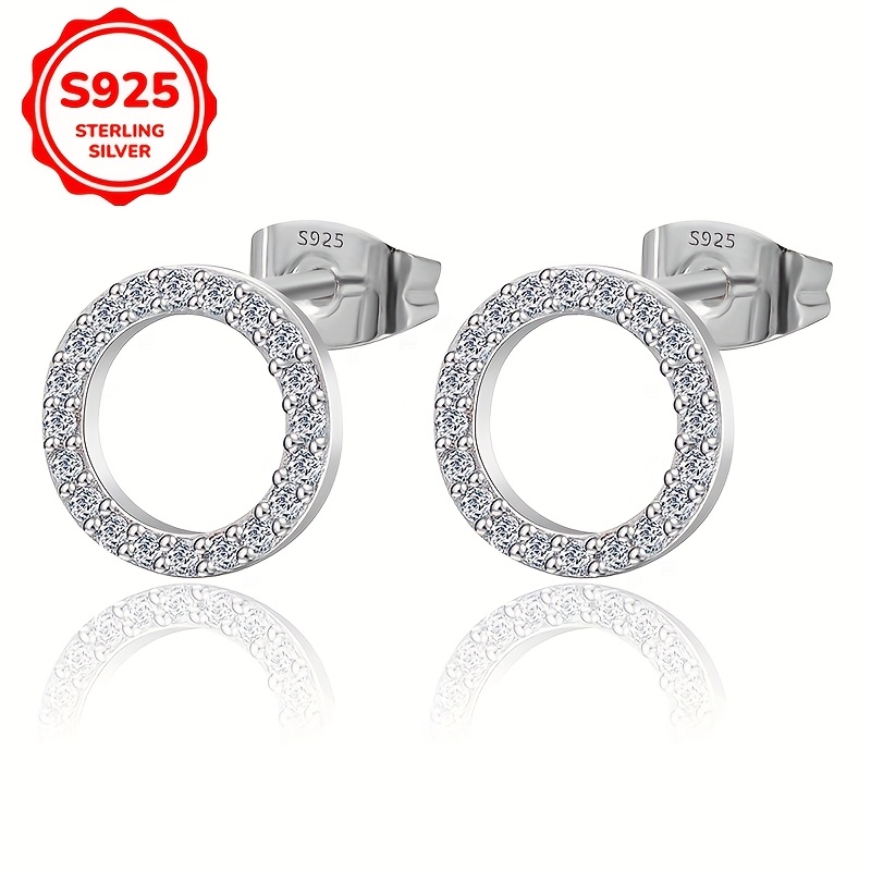 

Elegant And Unique Hollow Earrings With Synthetic Zirconia Inlaid In 925 Silver, Weighing 1.2g/0.042oz.