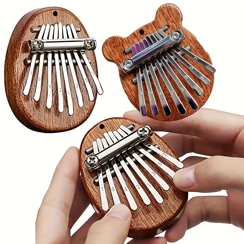 

8 Keys Mini Kalimba High Quality Finger Thumb Music Good Accessory Pendant Gift, Christmas And Halloween Gift, Thanksgiving Gift