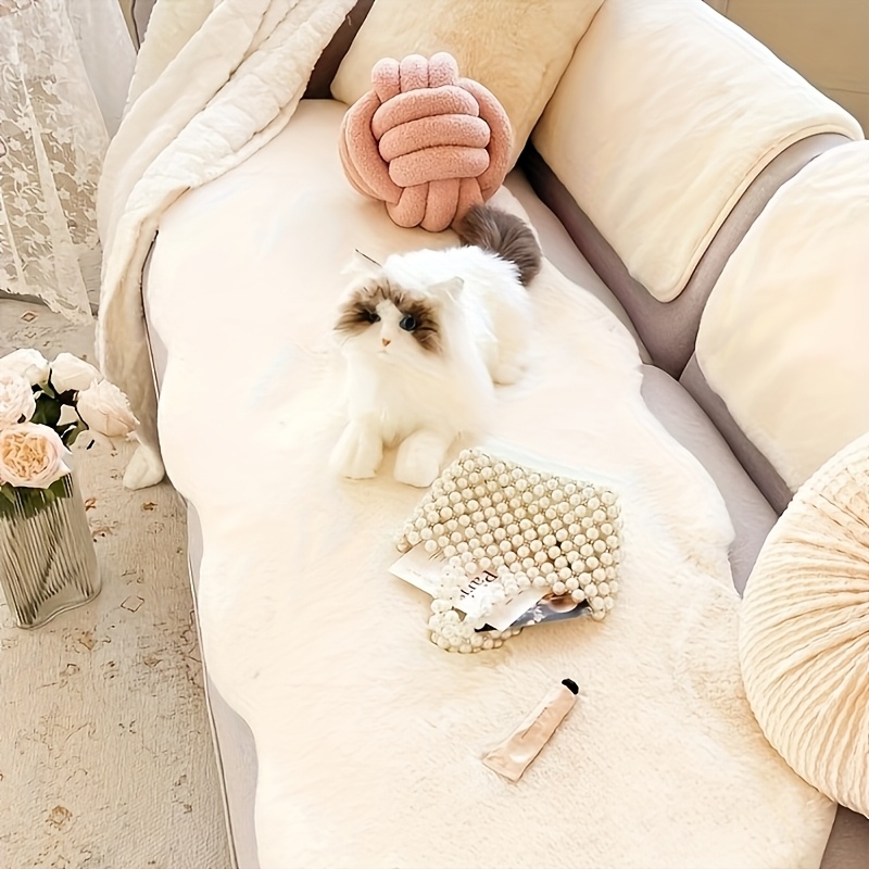 Image of A Plush Cream-colored Sofa Cushion With A Rabbit Texture, Featuring An Irregular Shape. A Thick And Luxurious Polyester Cushion Suitable For Areas Room Sofas And Bedside Mats