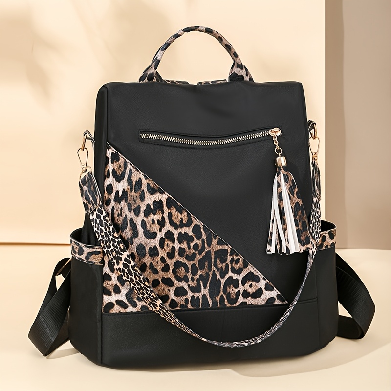 

A Stylish Women's Anti-theft Backpack With A Vintage Leopard Print Tassel Design, This Spacious Backpack Is Casual Travel And Use, Suitable For Work, Study, And Shopping.