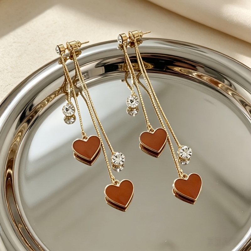 TEMU Une paire de clous d'oreilles à clous avec longues franges de cœur marron caramel, un style unique pour femme, compatibles avec diverses