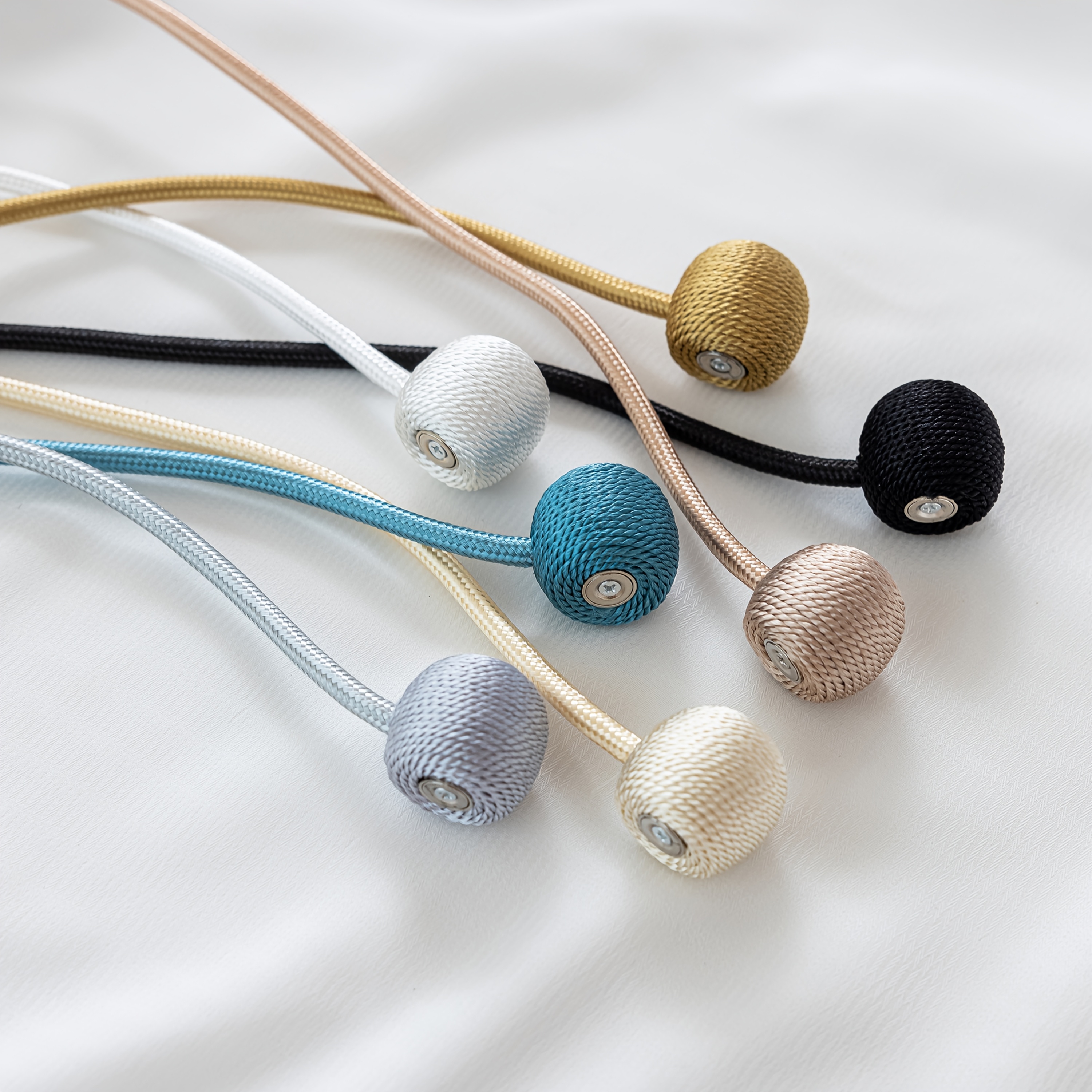 A Set of Two Modern Minimalist Magnetic Curtain Ties Is on, Featuring Thicker Twisted Ropes And Flexible Magnetic Ties. They Are Durable, Easy to Install, And Do Not Require Drilling, Making Them Perfect for Bedroom And Living Room Decor