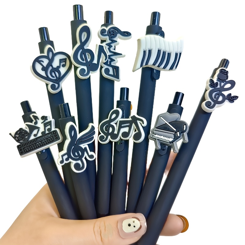 

5pcs Music Note Series Retractable Ballpoint Pens, Medium Point, Plastic Black Barrel With Random Music-themed Pvc Soft Rubber Decals